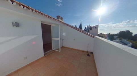 Foto 2 de Casa adosada en venta en Torremuelle, Benalmádena