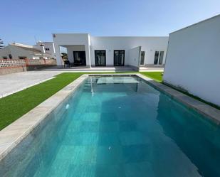 Swimming pool of Single-family semi-detached for sale in Chiclana de la Frontera  with Air Conditioner and Furnished