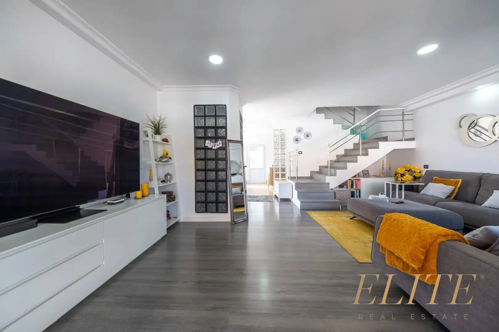 Sala de estar de Casa adosada en venta en San Bartolomé de Tirajana con Aire acondicionado, Jardín privado y Terraza