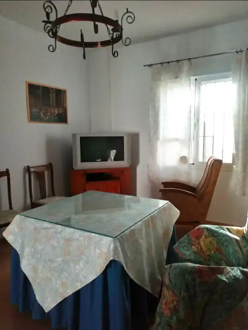 Sala de estar de Casa adosada en venta en Llerena con Aire acondicionado, Trastero y Amueblado