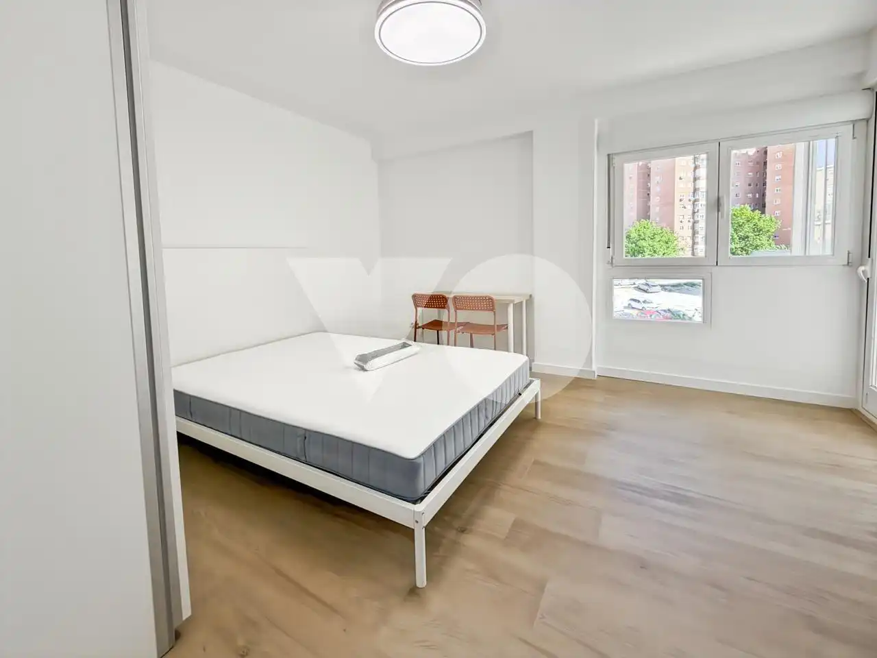 Habitación de Piso para compartir en Madrid con Calefacción y Amueblado