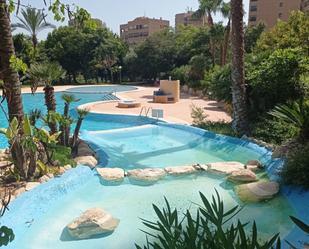 Swimming pool of Flat for sale in Benidorm  with Air Conditioner, Heating and Storage room