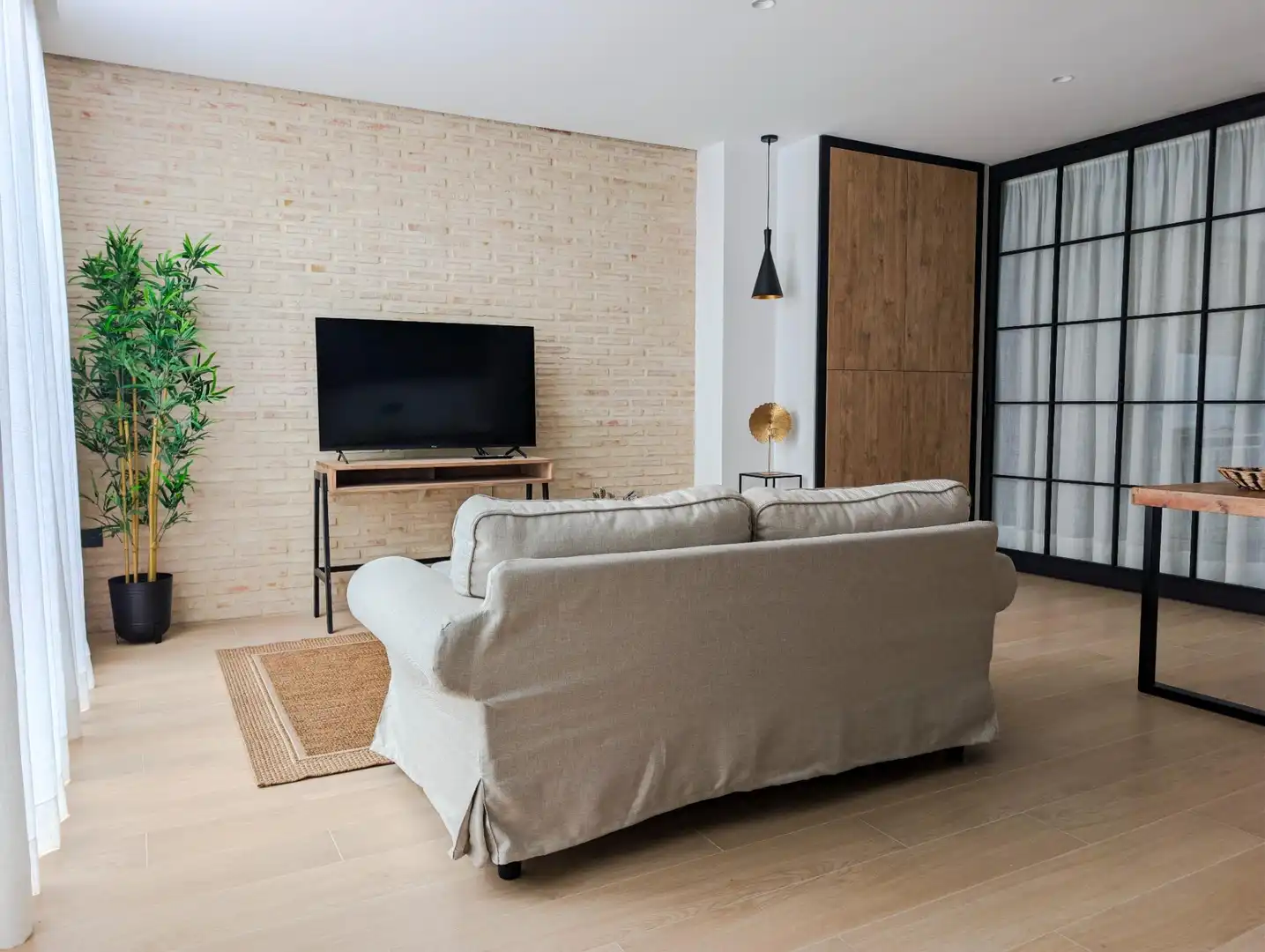 Living room of Flat for rent in Sanlúcar la Mayor  with Air Conditioner, Heating and Furnished
