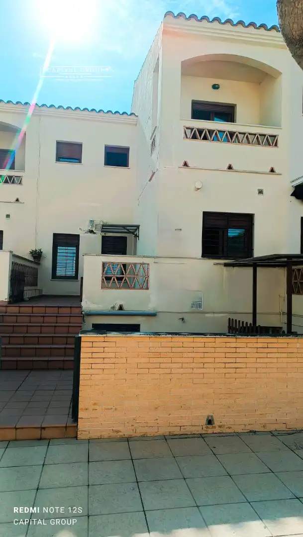 Exterior view of Houses for sale in Punta Umbría  with Terrace, Balcony and Community pool
