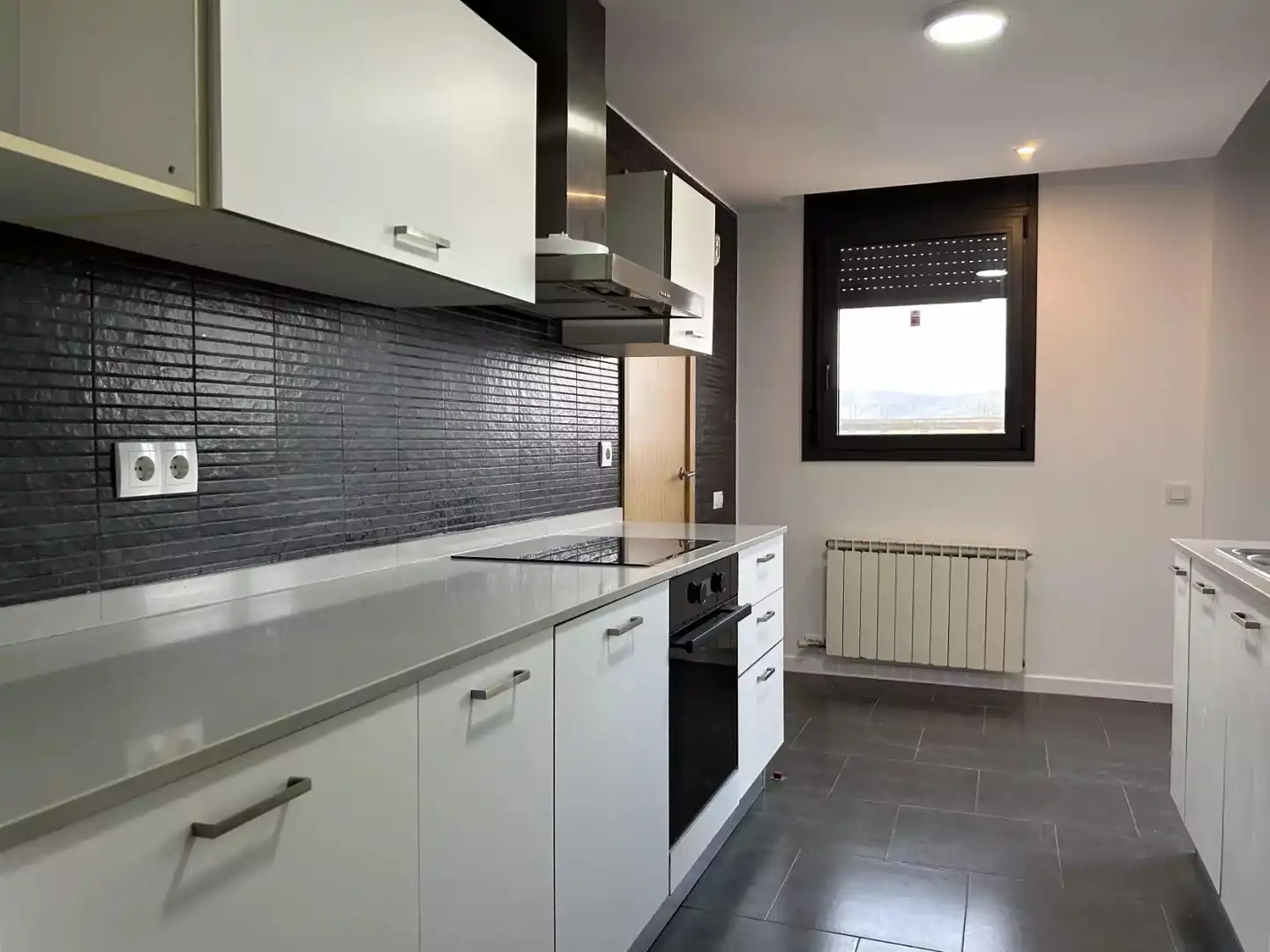 Kitchen of Flat for sale in Hostalric  with Parquet flooring, Terrace and Storage room