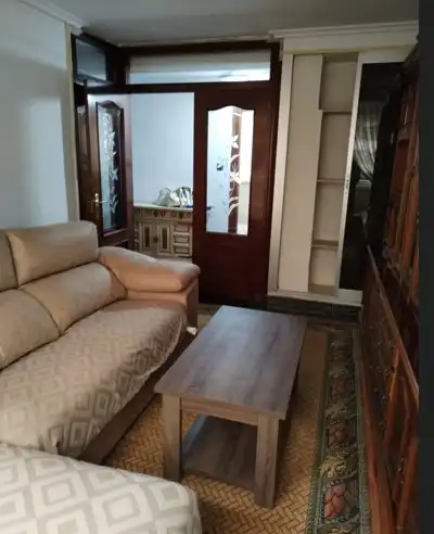 Sala de estar de Piso en venta en Gijón  con Calefacción, Jardín privado y Amueblado