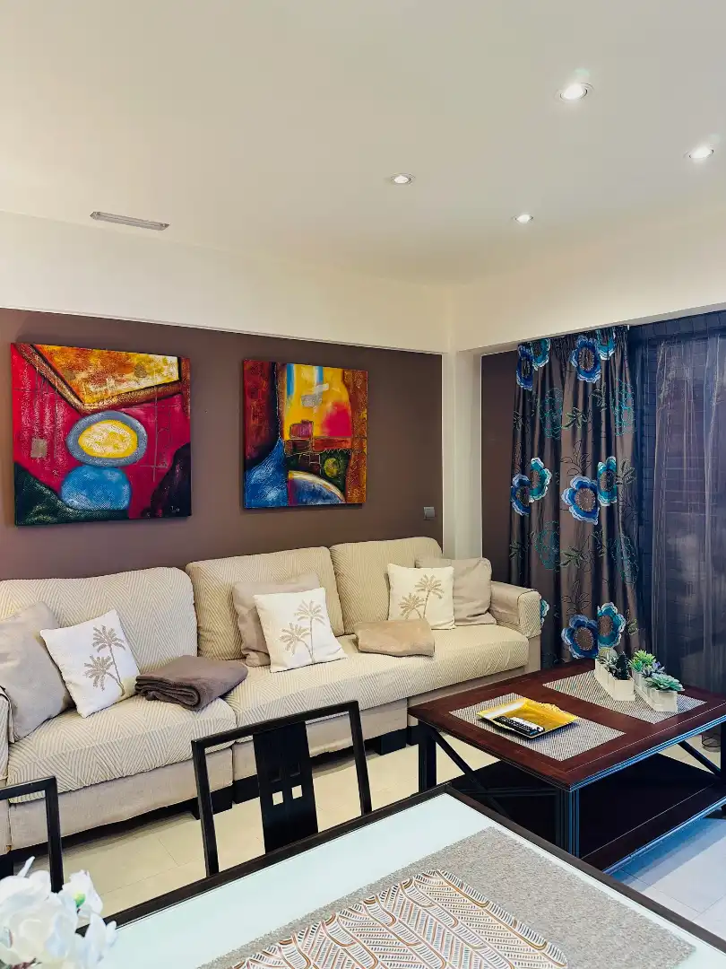 Sala de estar de Piso en venta en Palamós con Aire acondicionado, Terraza y Amueblado