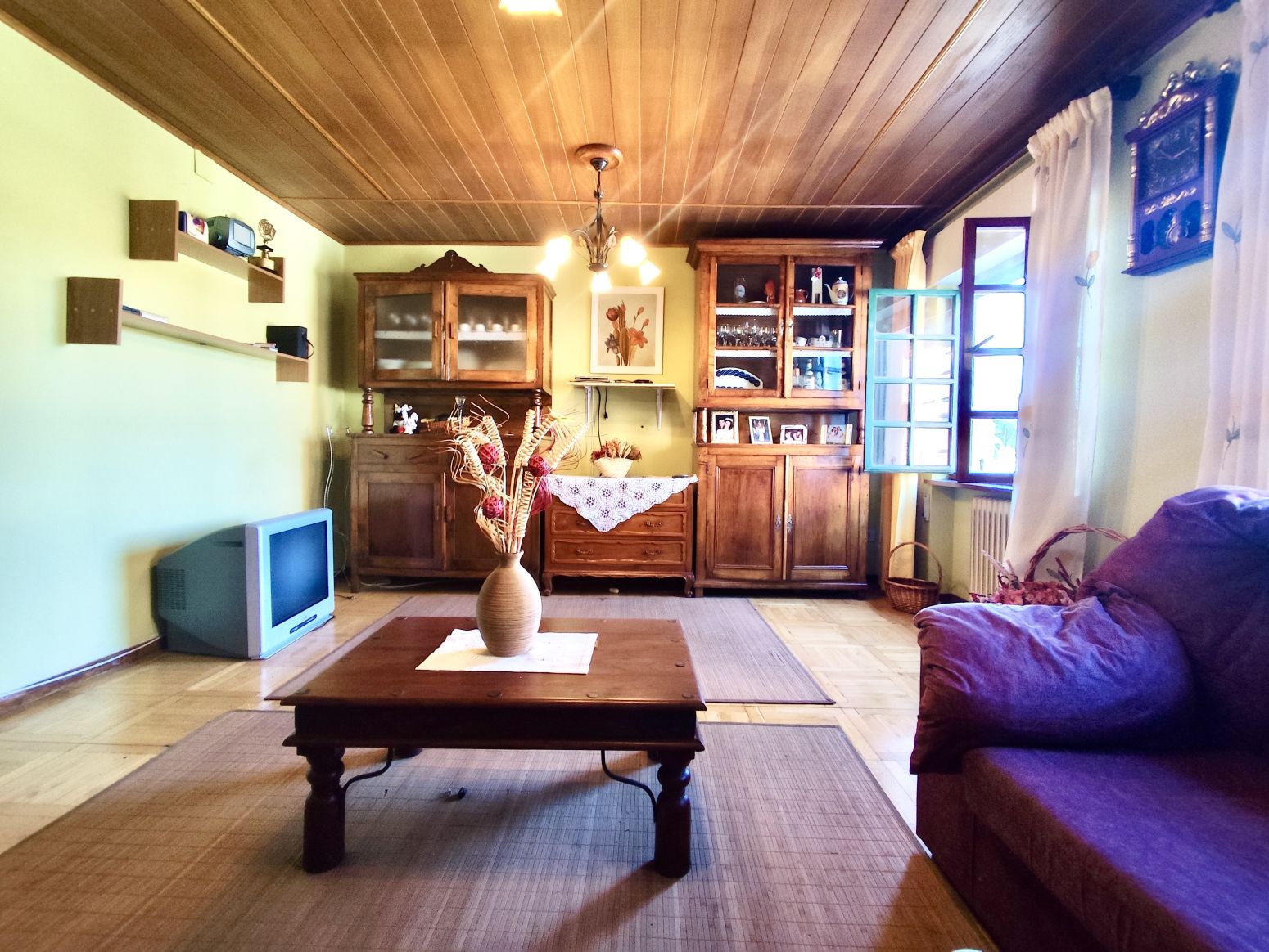 Sala de estar de Piso en venta en El Franco  con Calefacción, Parquet y Terraza