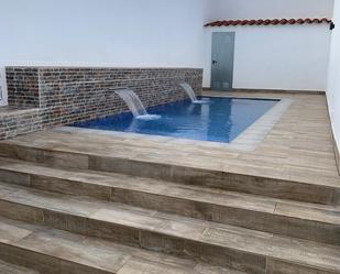 Swimming pool of Planta baja for sale in Sabadell  with Air Conditioner, Heating and Terrace