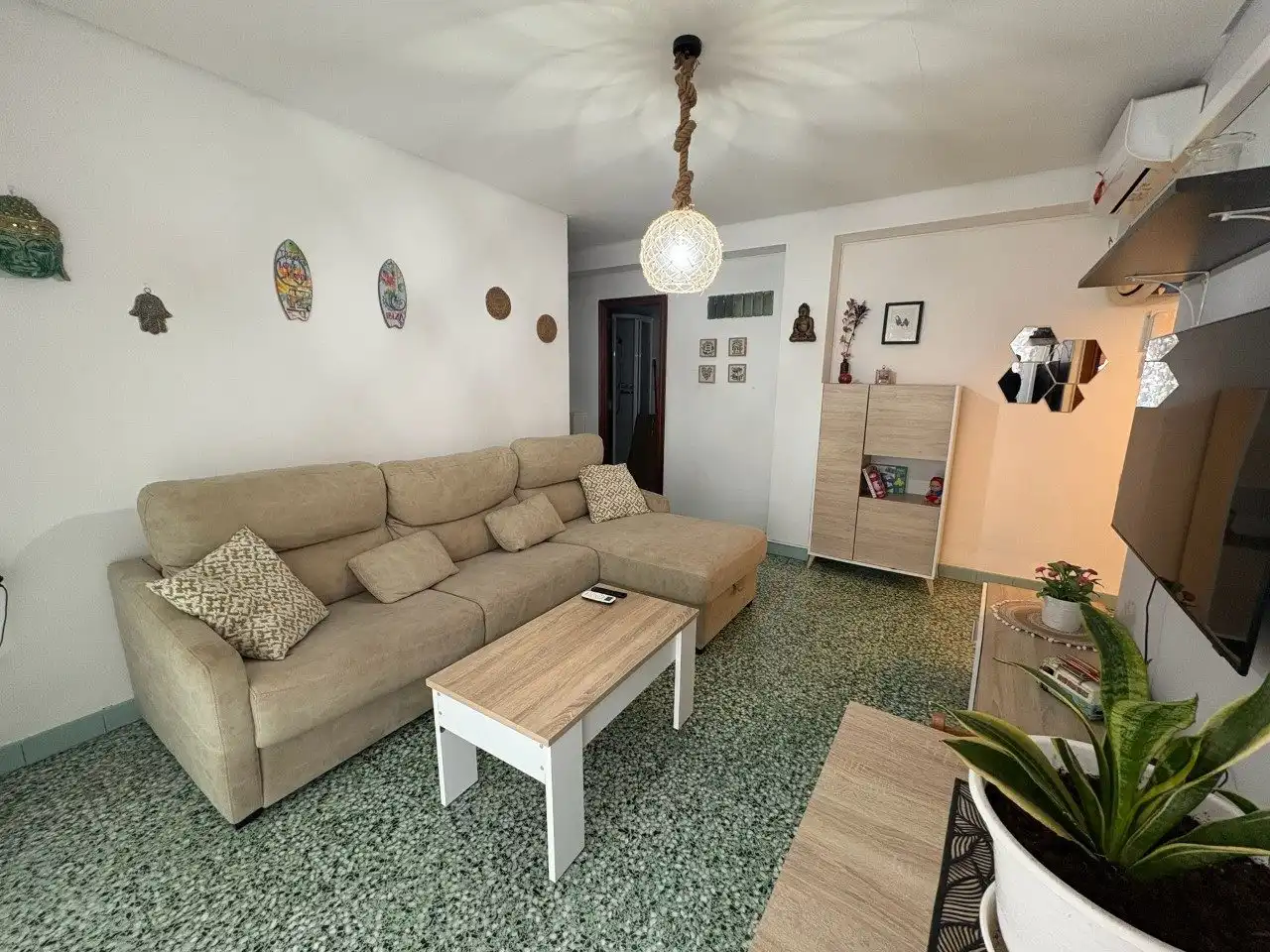 Wohnzimmer von Wohnung zum Verkauf in Cullera mit Klimaanlage, Privatgarten und Terrasse