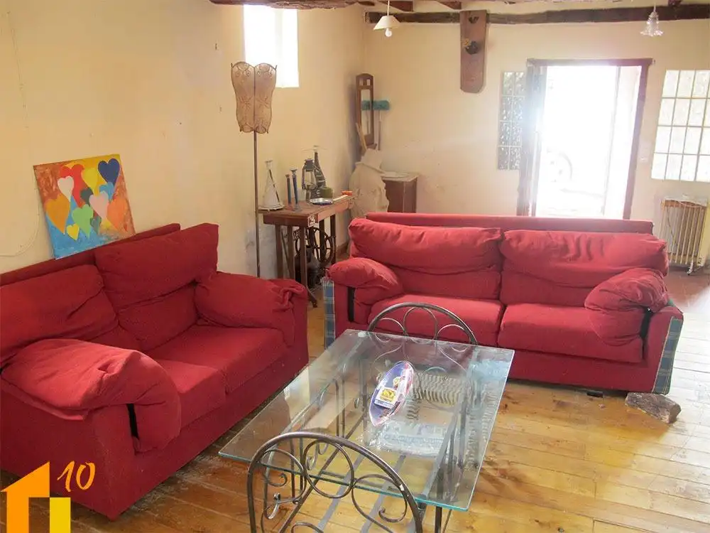 Living room of Houses for sale in Revillarruz  with Heating and Storage room