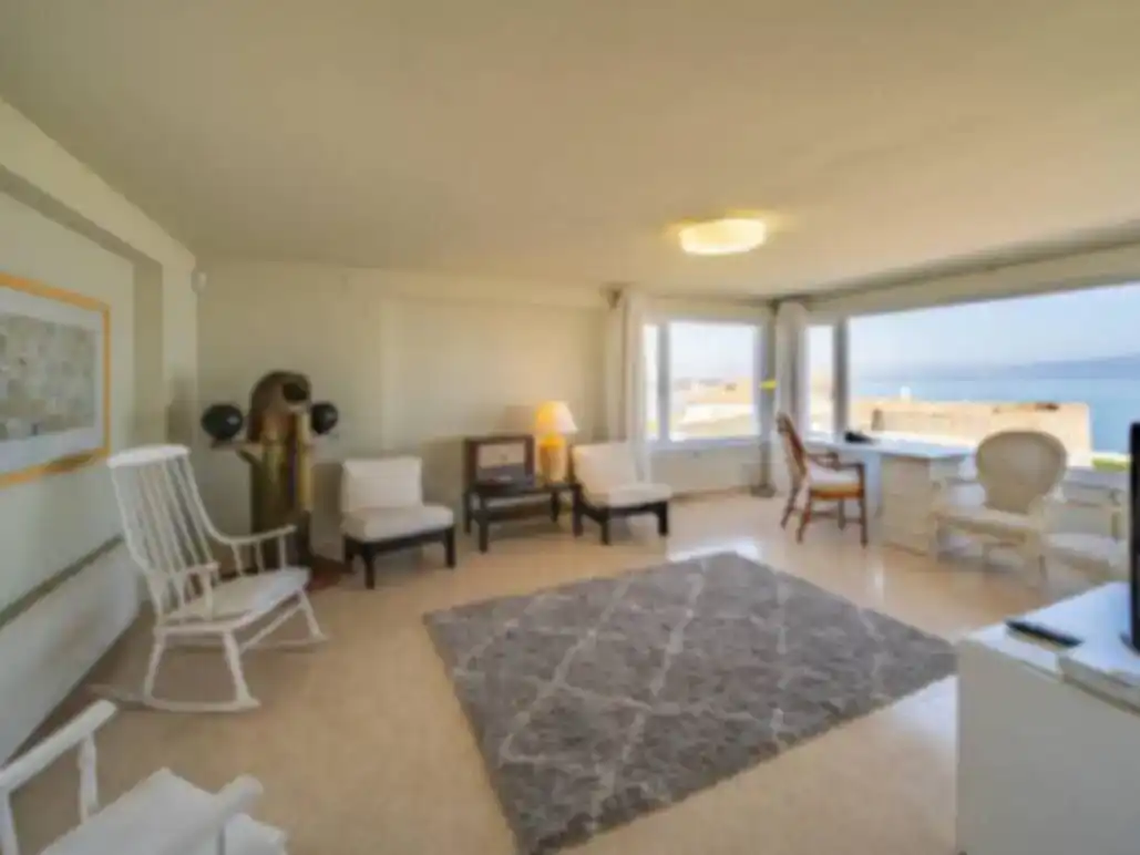 Sala de estar de Piso de alquiler en L'Escala con Aire acondicionado, Piscina y Amueblado