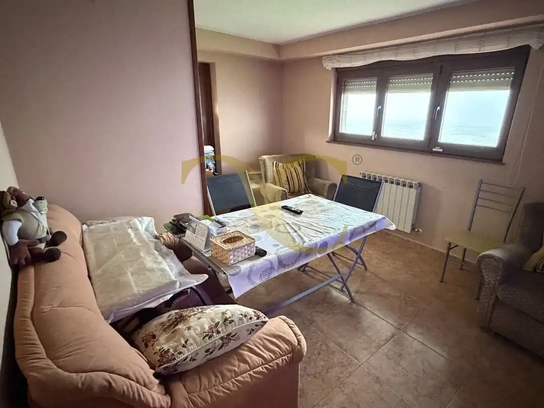 Sala d'estar de Casa o xalet en venda en Navia amb Calefacció, Jardí privat i Traster