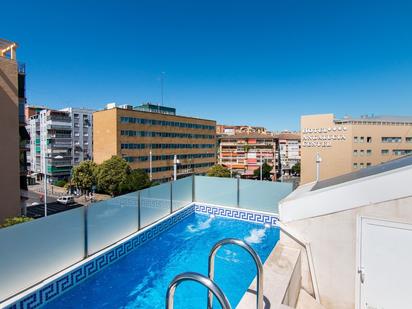 Swimming pool of Single-family semi-detached for sale in  Granada Capital  with Air Conditioner, Terrace and Swimming Pool