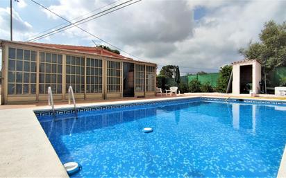 Swimming pool of House or chalet for sale in Gandia  with Air Conditioner, Terrace and Swimming Pool