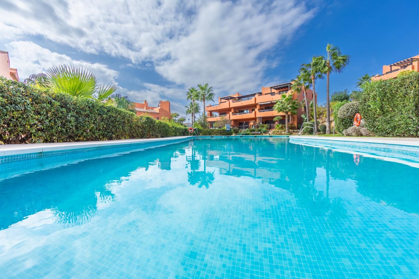 Swimming pool of Apartment for sale in Estepona  with Parquet flooring, Terrace and Storage room