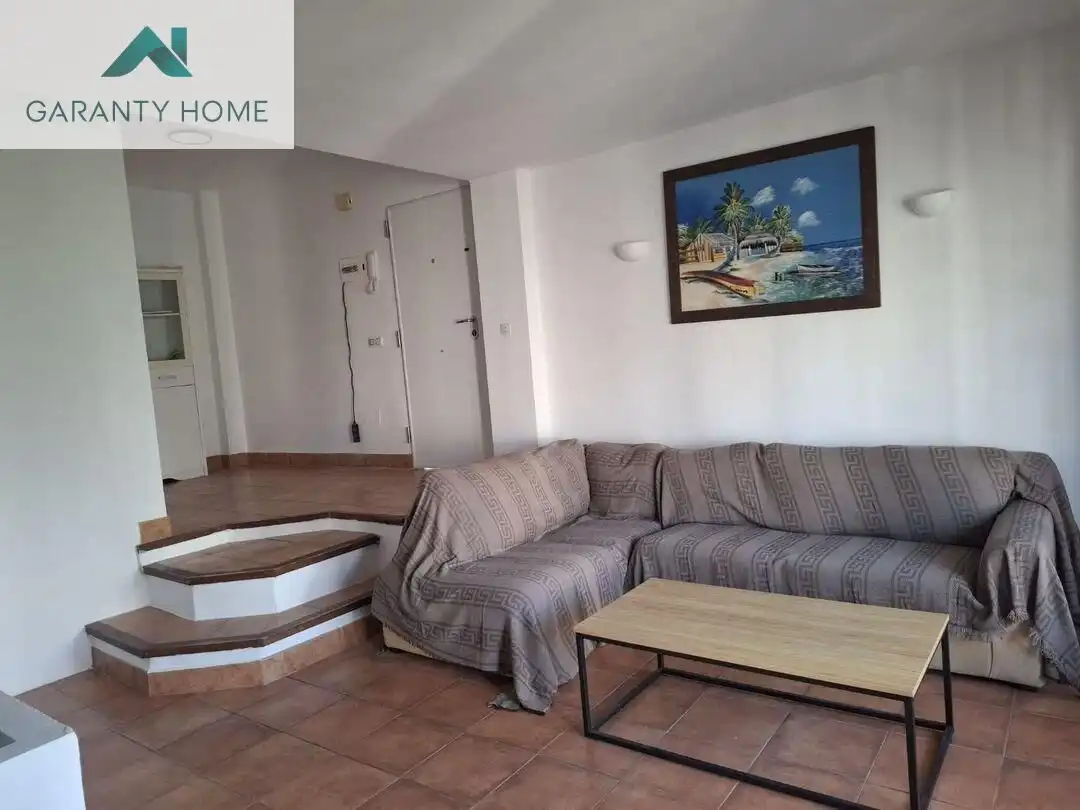Sala d'estar de Dúplex de lloguer en Torremolinos amb Calefacció, Jardí privat i Terrassa