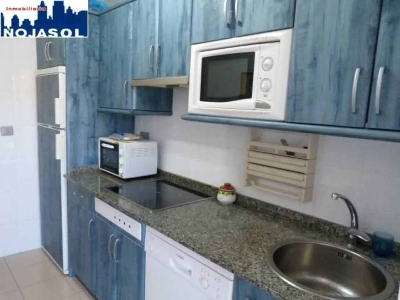 Cuina de Apartament de lloguer en Arnuero amb Calefacció, Jardí privat i Terrassa