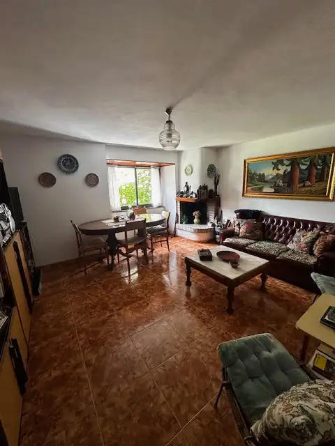Sala de estar de Casa adosada en venta en Cudillero con Calefacción, Jardín privado y Terraza