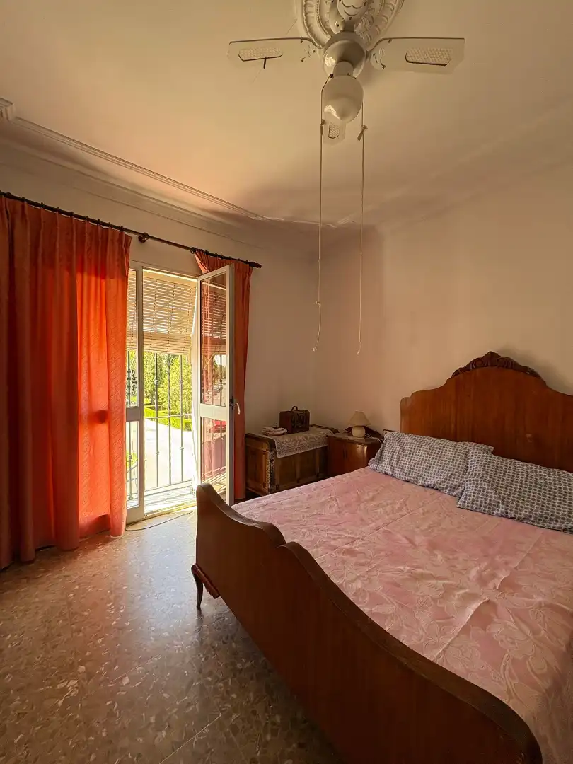 Habitación de Casa adosada en venta en Carmona con Aire acondicionado, Terraza y Amueblado