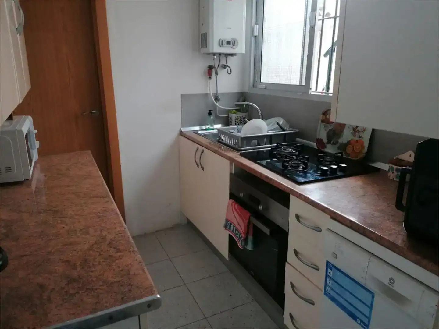 Cuina de Pis per a compartir en Alcalá del Río amb Aire condicionat i Moblat