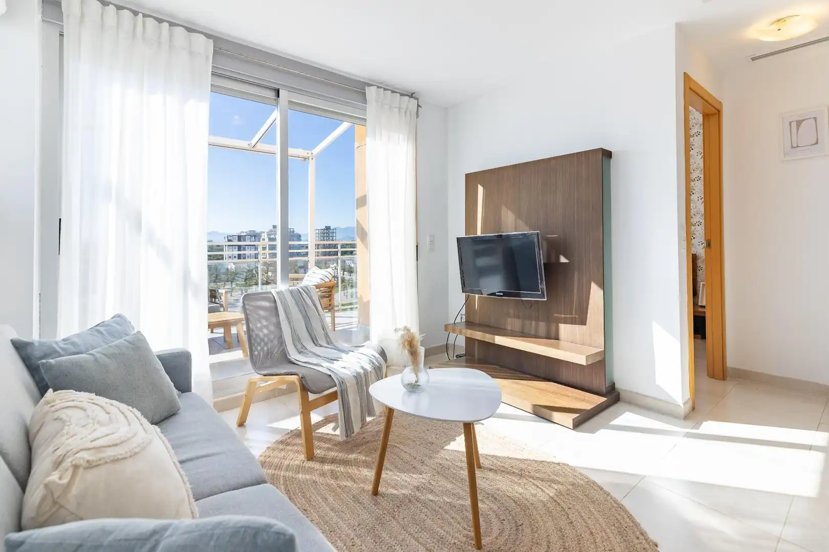 Sala de estar de Ático en venta en Piles con Aire acondicionado, Terraza y Piscina comunitaria