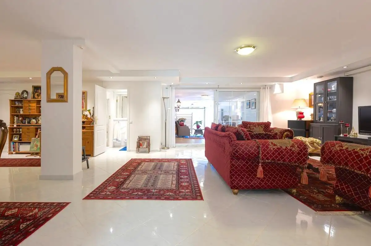 Sala d'estar de Casa adosada en venda en Mogán amb Jardí privat, Terrassa i Piscina