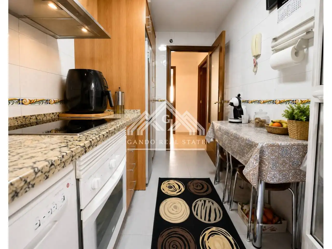 Kitchen of Flat for sale in Dos Hermanas  with Air Conditioner, Private garden and Storage room
