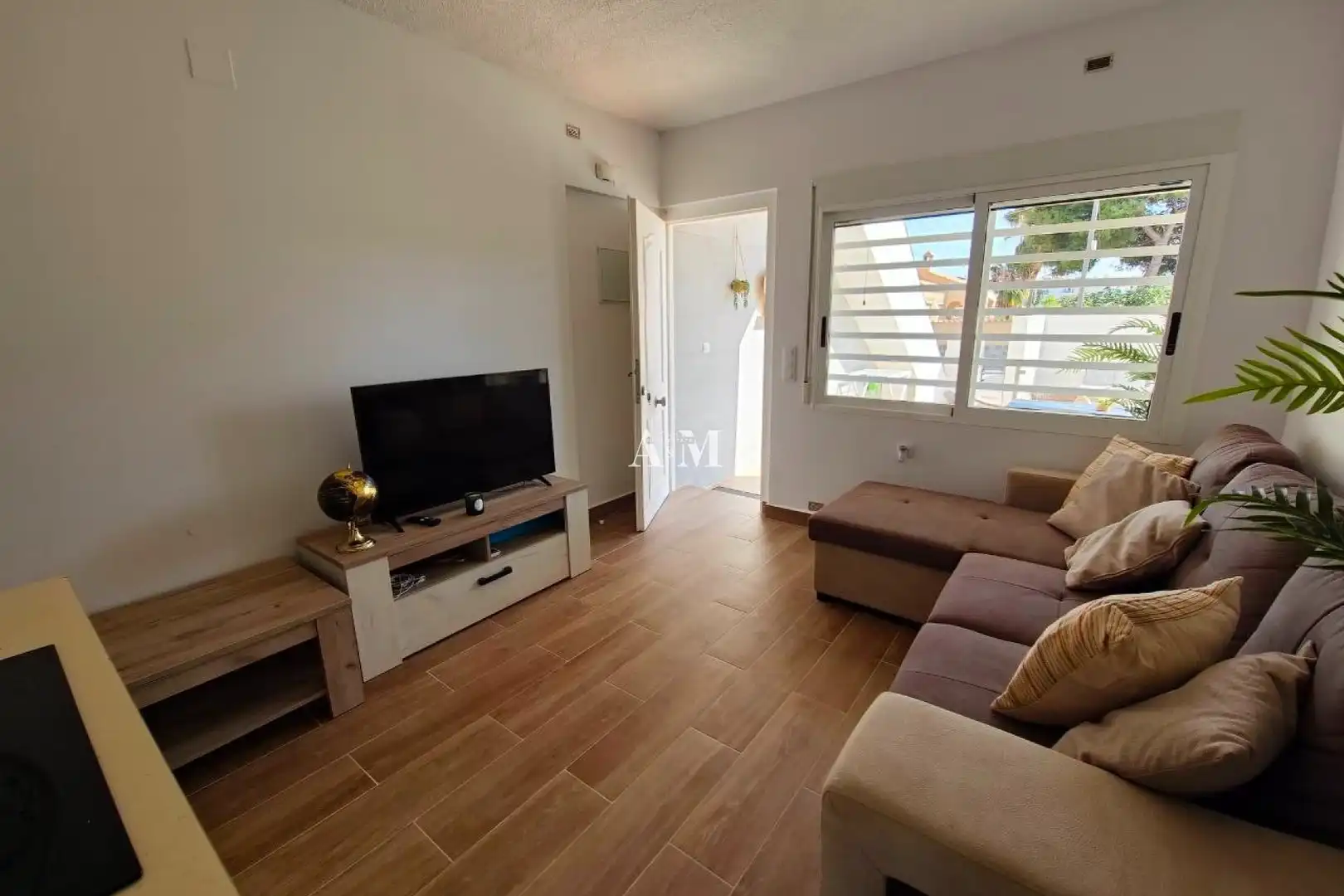 Sala de estar de Casa adosada de alquiler en Orihuela con Aire acondicionado, Terraza y Piscina