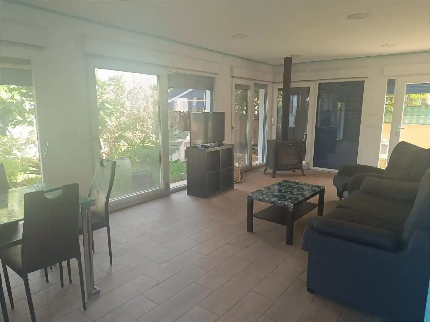 Sala d'estar de Casa o xalet de lloguer en Gandia amb Aire condicionat i Piscina