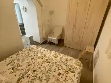 Schlafzimmer von Erdgeschoss zur Miete in Es Mercadal mit Klimaanlage, Heizung und Terrasse