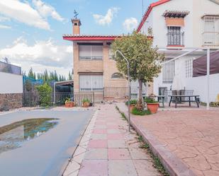 Exterior view of Single-family semi-detached for sale in La Zubia  with Air Conditioner, Heating and Private garden