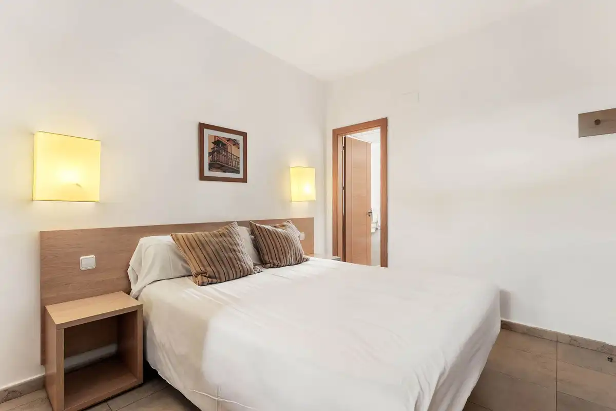 Habitación de Apartamento en venta en Manilva con Aire acondicionado, Terraza y Piscina comunitaria