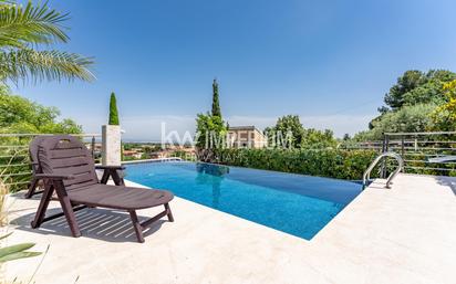 Swimming pool of House or chalet for sale in Castellvell del Camp  with Air Conditioner, Heating and Private garden