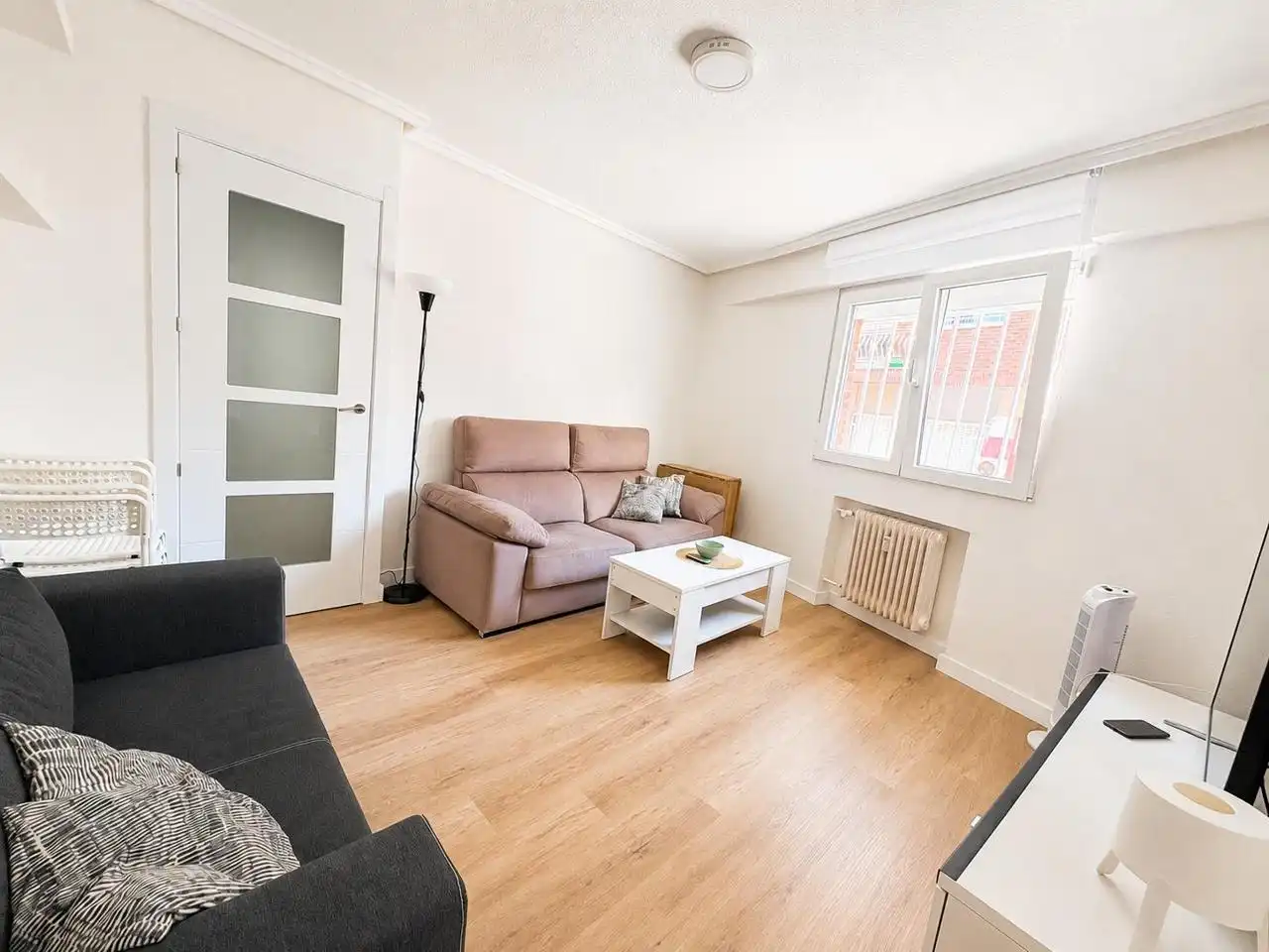 Sala d'estar de Planta baixa de lloguer en Madrid amb Moblat