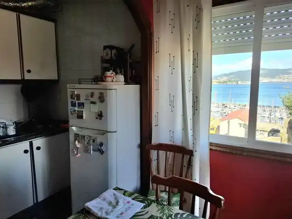 Cuina de Apartament en venda en Moaña amb Calefacció, Parquet i Traster
