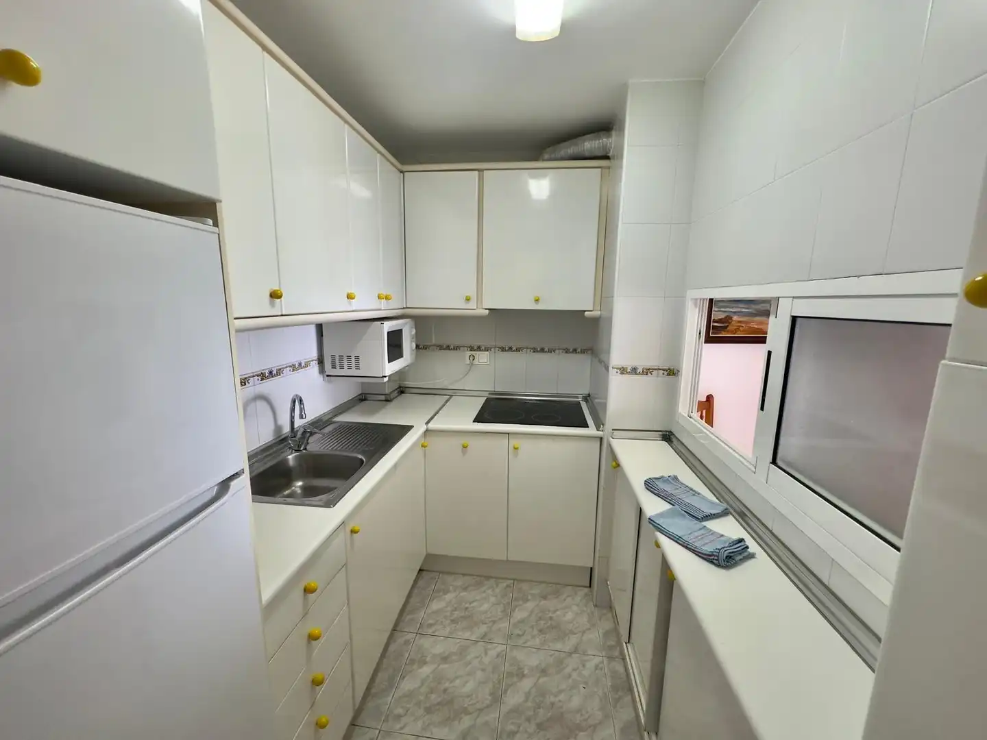 Cuina de Apartament en venda en Benidorm amb Aire condicionat, Terrassa i Moblat