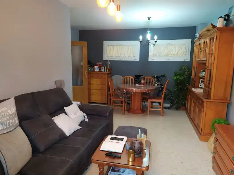 Sala de estar de Piso en venta en Vélez-Málaga con Trastero, Amueblado y Piscina comunitaria