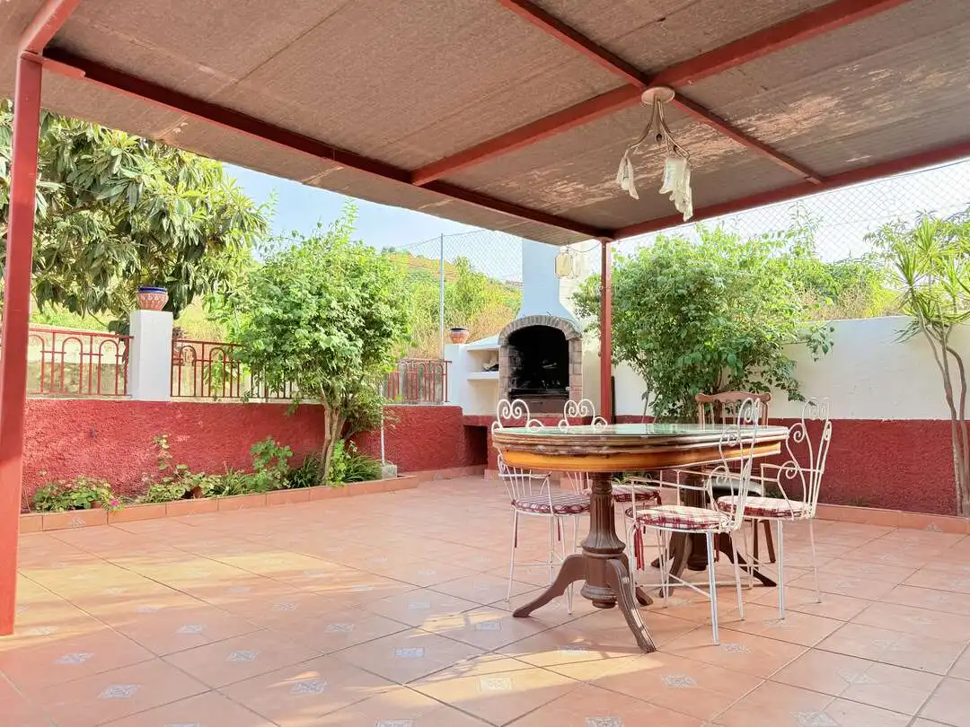 Terrassa de Casa o xalet en venda en Benamocarra amb Jardí privat i Moblat