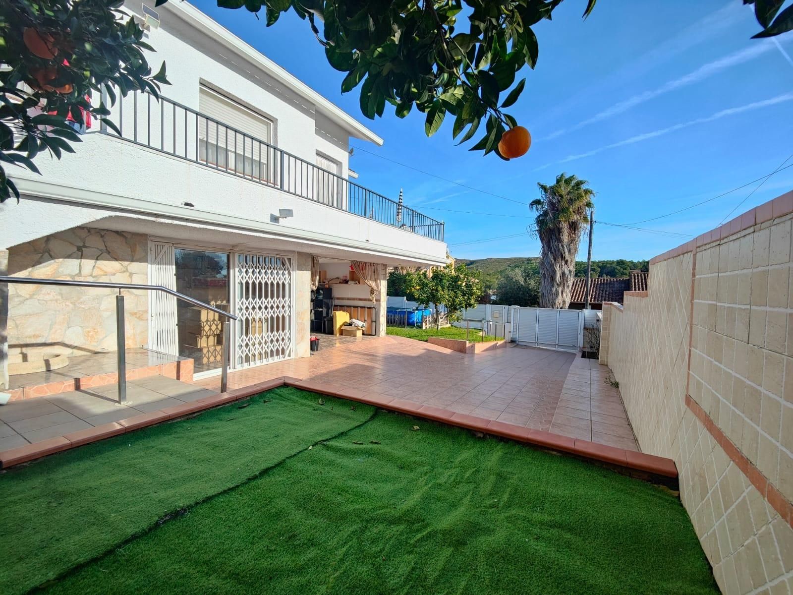 Exterior view of House or chalet for sale in La Pobla de Montornès    with Air Conditioner, Private garden and Terrace