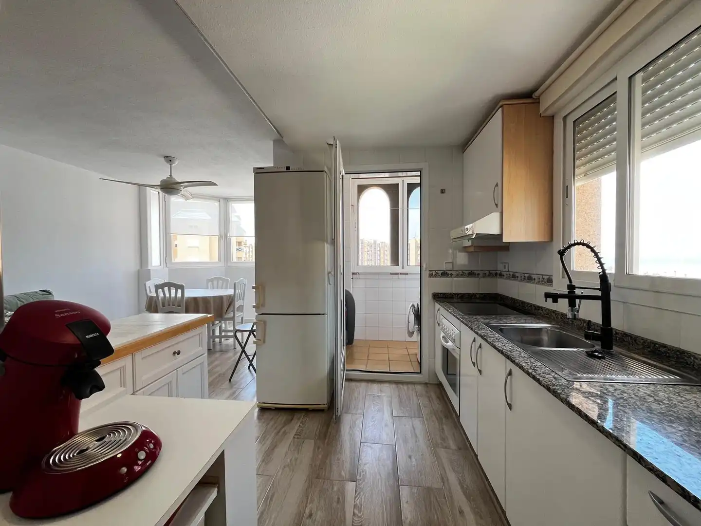 Kitchen of Flat for sale in La Manga del Mar Menor  with Air Conditioner, Private garden and Furnished