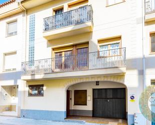 Vista exterior de Casa adosada en venda en L'Ametlla de Mar  amb Calefacció, Jardí privat i Terrassa