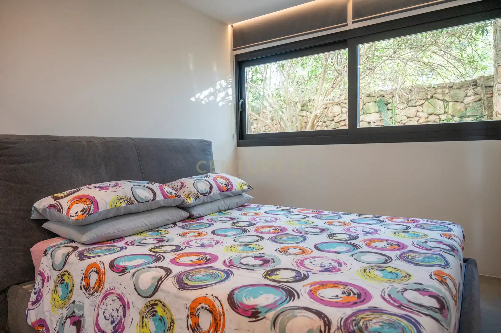 Habitación de Apartamento de alquiler en Santa Eulària des Riu con Aire acondicionado, Jardín privado y Piscina comunitaria