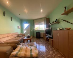 Sala d'estar de Casa adosada en venda en La Galera  amb Terrassa