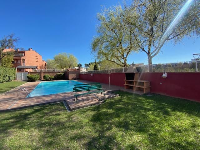 Swimming pool of Single-family semi-detached for sale in  Lleida Capital  with Heating and Private garden