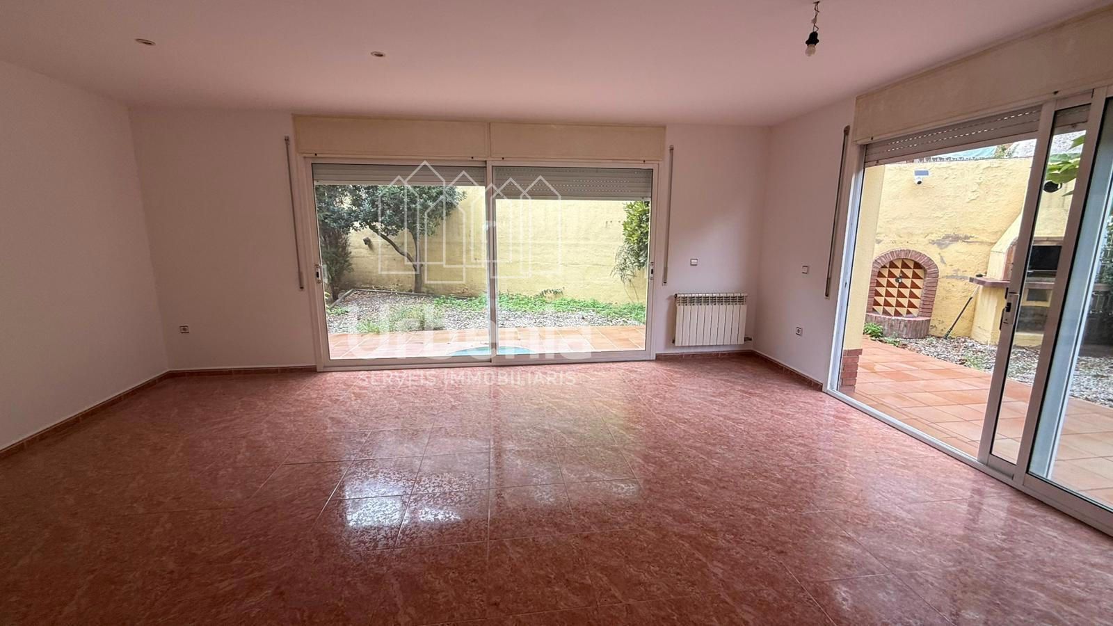 Sala de estar de Casa adosada en venta en Tordera con Calefacción, Jardín privado y Terraza