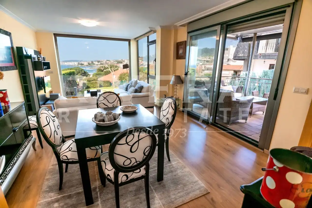 Sala de estar de Casa adosada en venta en Sanxenxo con Calefacción, Jardín privado y Terraza