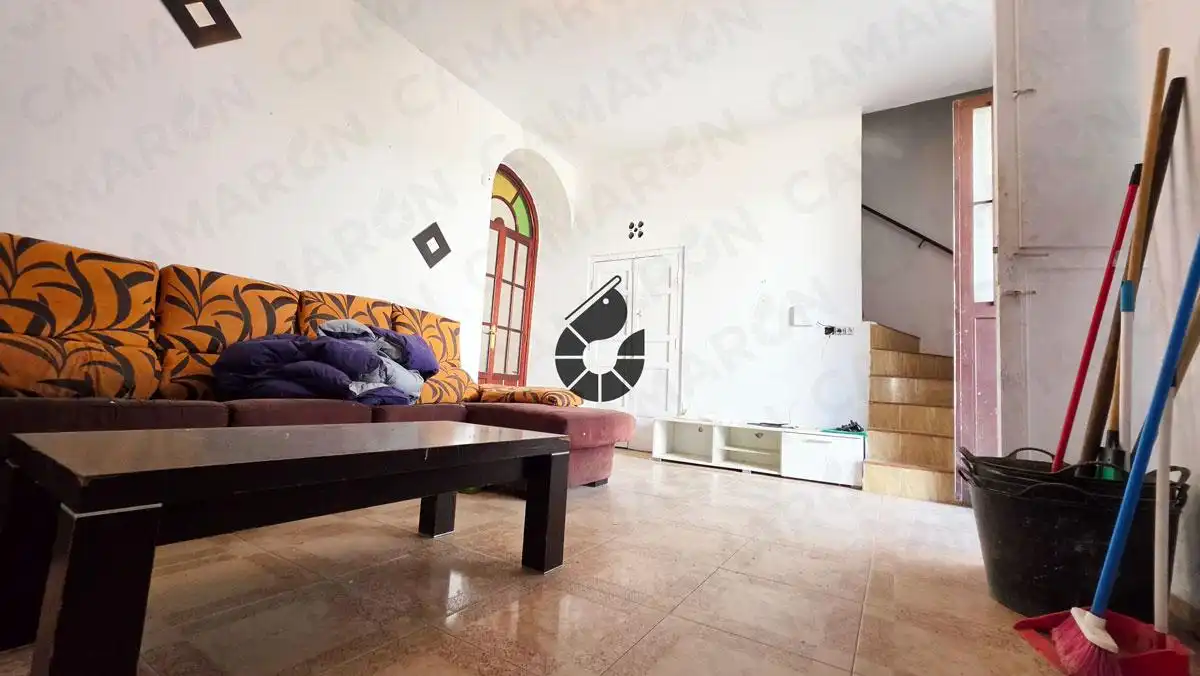 Sala de estar de Casa adosada en venta en Almensilla con Jardín privado, Balcón y Alarma
