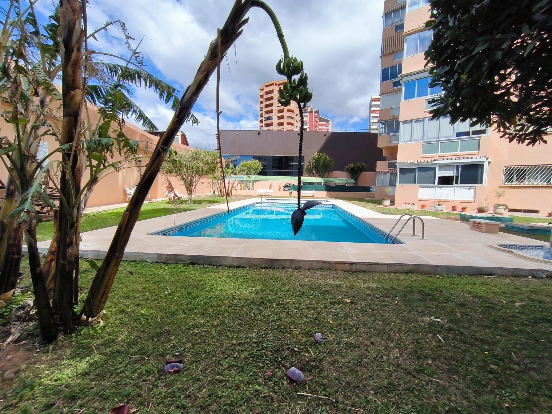 Swimming pool of Flat for sale in Benidorm  with Air Conditioner, Private garden and Terrace
