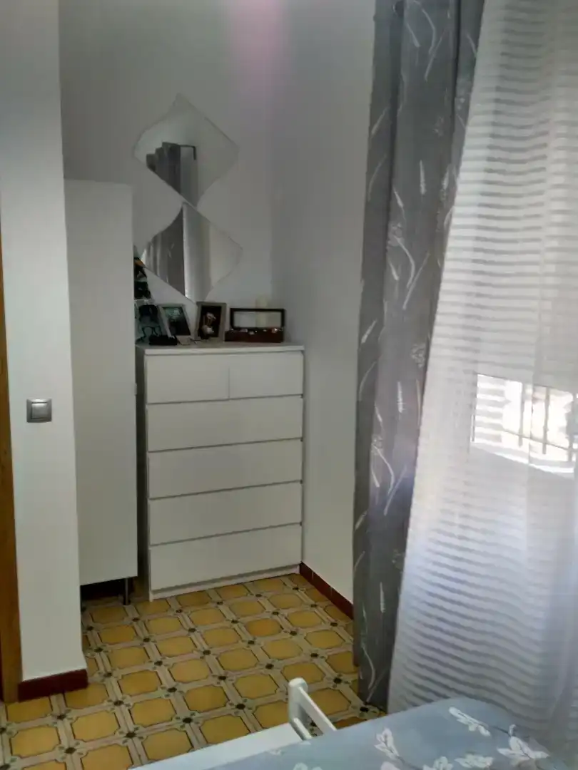 Dormitori de Casa adosada de lloguer en Punta Umbría amb Aire condicionat, Moblat i Rentadora